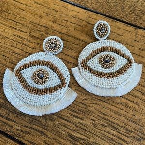 eye statement earrings